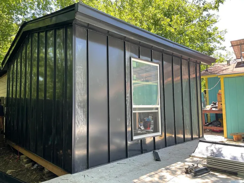 Black standing seam metal wall panels for Roof Inspection in Mantua